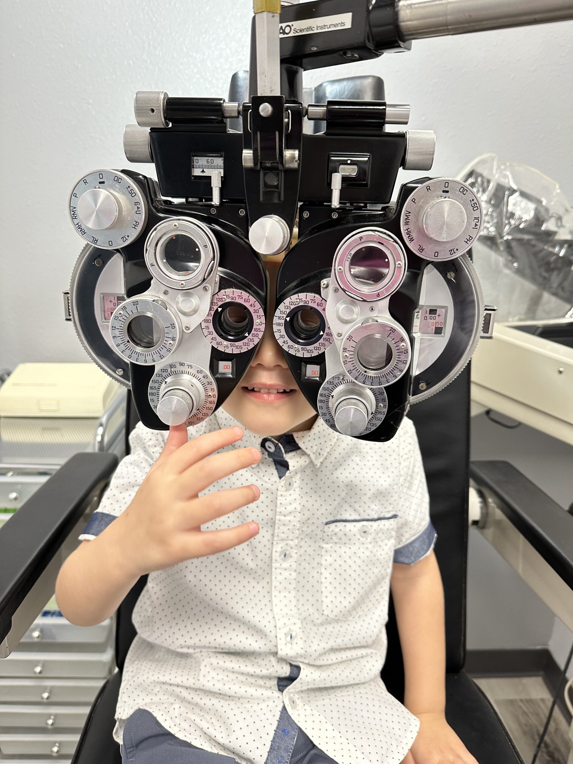 Child receiving professional eye care at Buitique Optometry